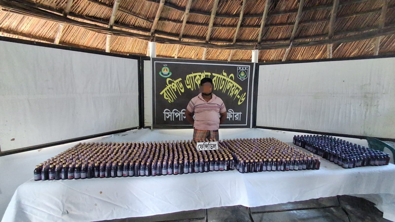 দেবহাটায় র‌্যাবের অভিযানে ১,০৩৫ বোতল ফেন্সিডিল উদ্ধার, আটক ১
